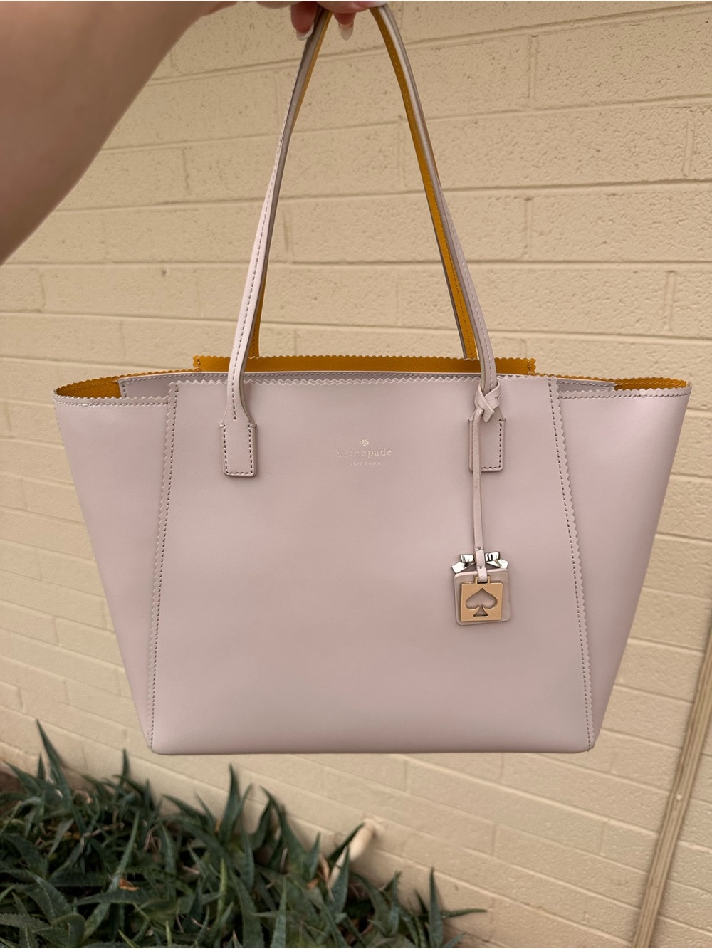 kate spade pale pink tote with yellow interior